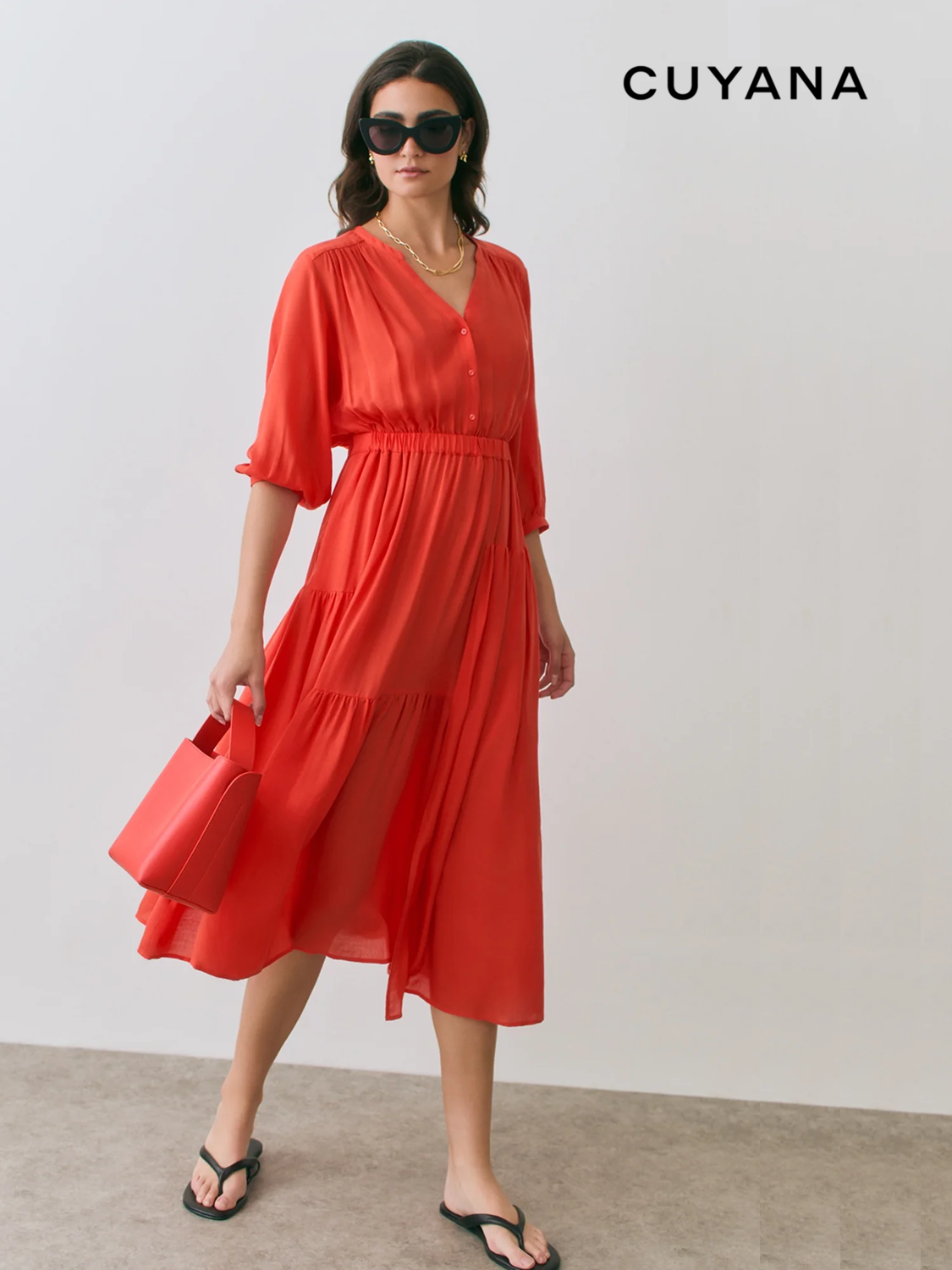 Cuyana red dress look.